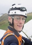 Headshot of James Hamilton.