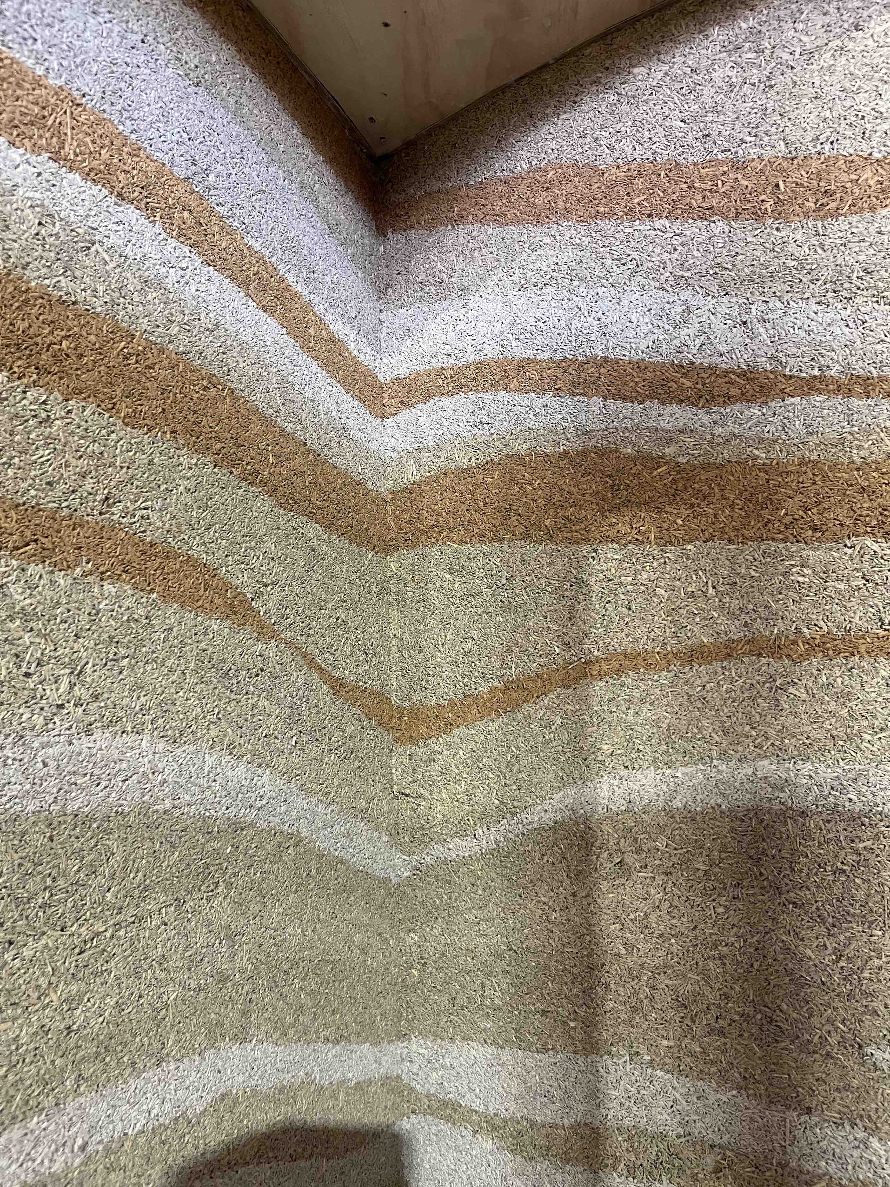 Prototype wall displaying the material in different hempcrete tones.