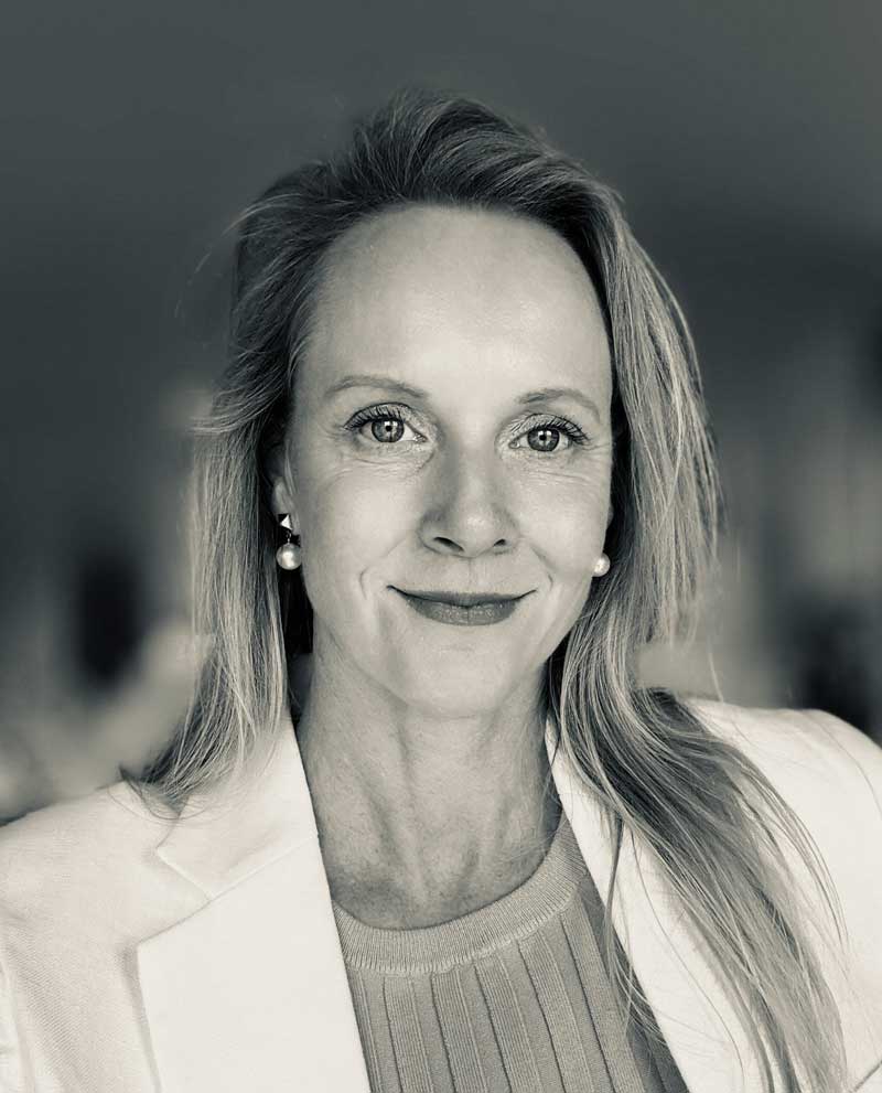 Black and white headshot of Sarah Courtney.